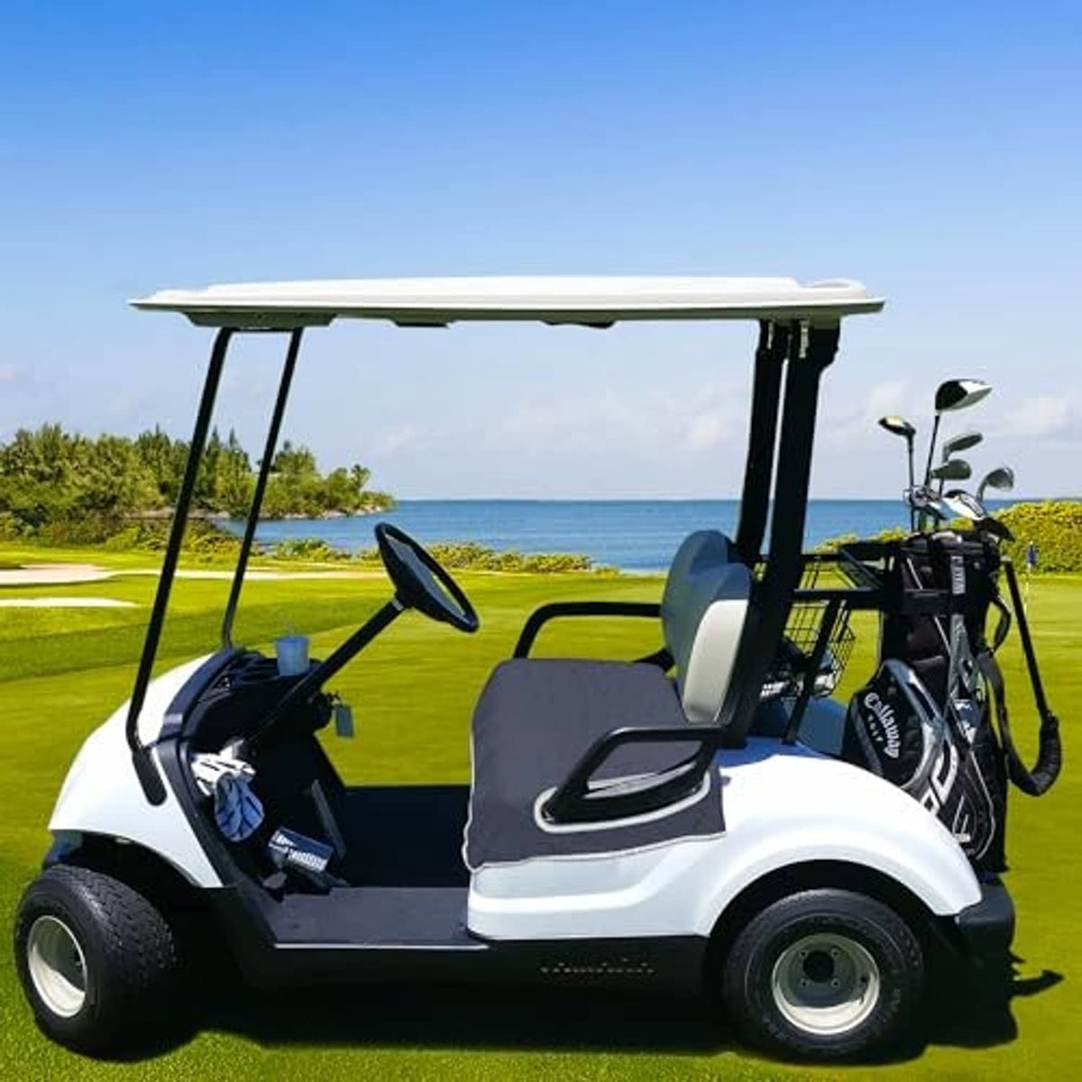 Dark grey seat cushion cover with white trim on golf cart, fitted towel-style fabric