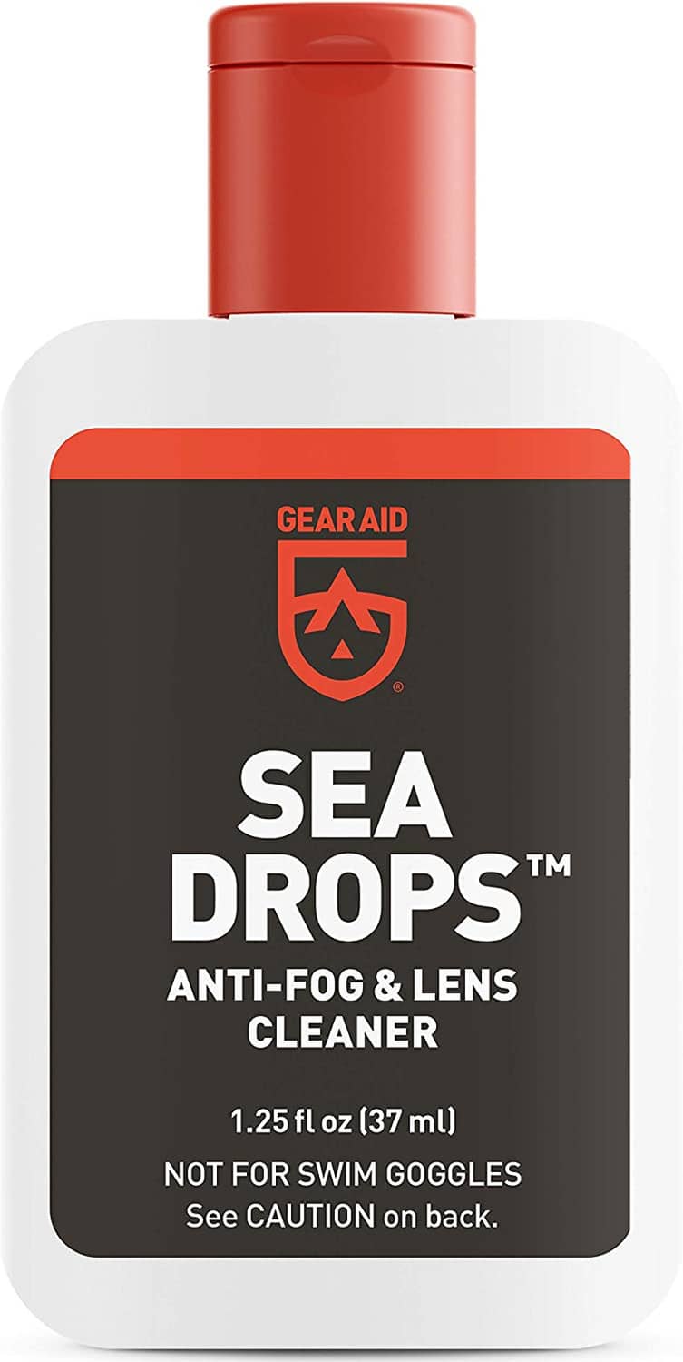 Anti-fog & lens cleaner bottle with red cap and dark Sea Drops label