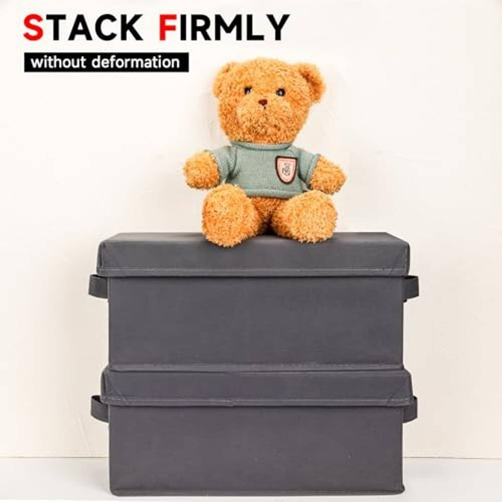 Stacked gray CD storage boxes with handles, designed to stay firmly together