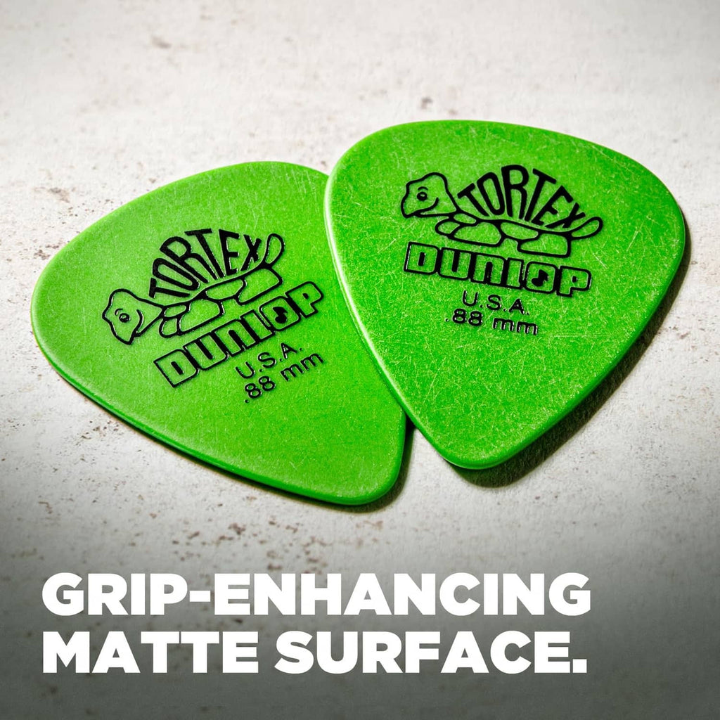 Two green Dunlop Tortex guitar picks, U.S.A., .88 mm, with logo text.