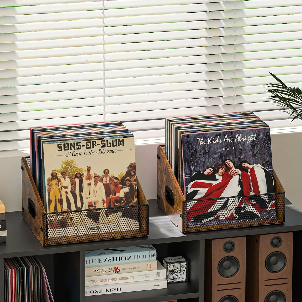 Rustic brown record crate with black wire mesh front holding stacked vinyl records