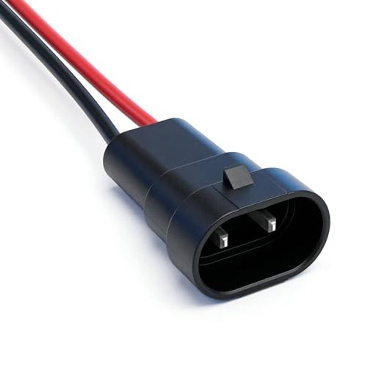 Black male connector housing with two metal contacts and attached red/black wires.
