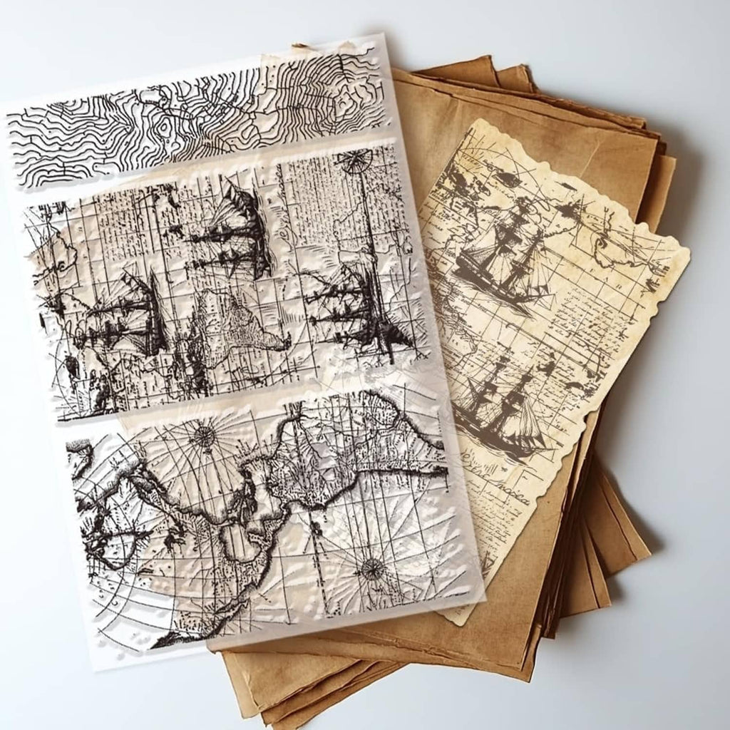 Clear stamp set featuring vintage ocean and world map designs with sailboat silhouettes