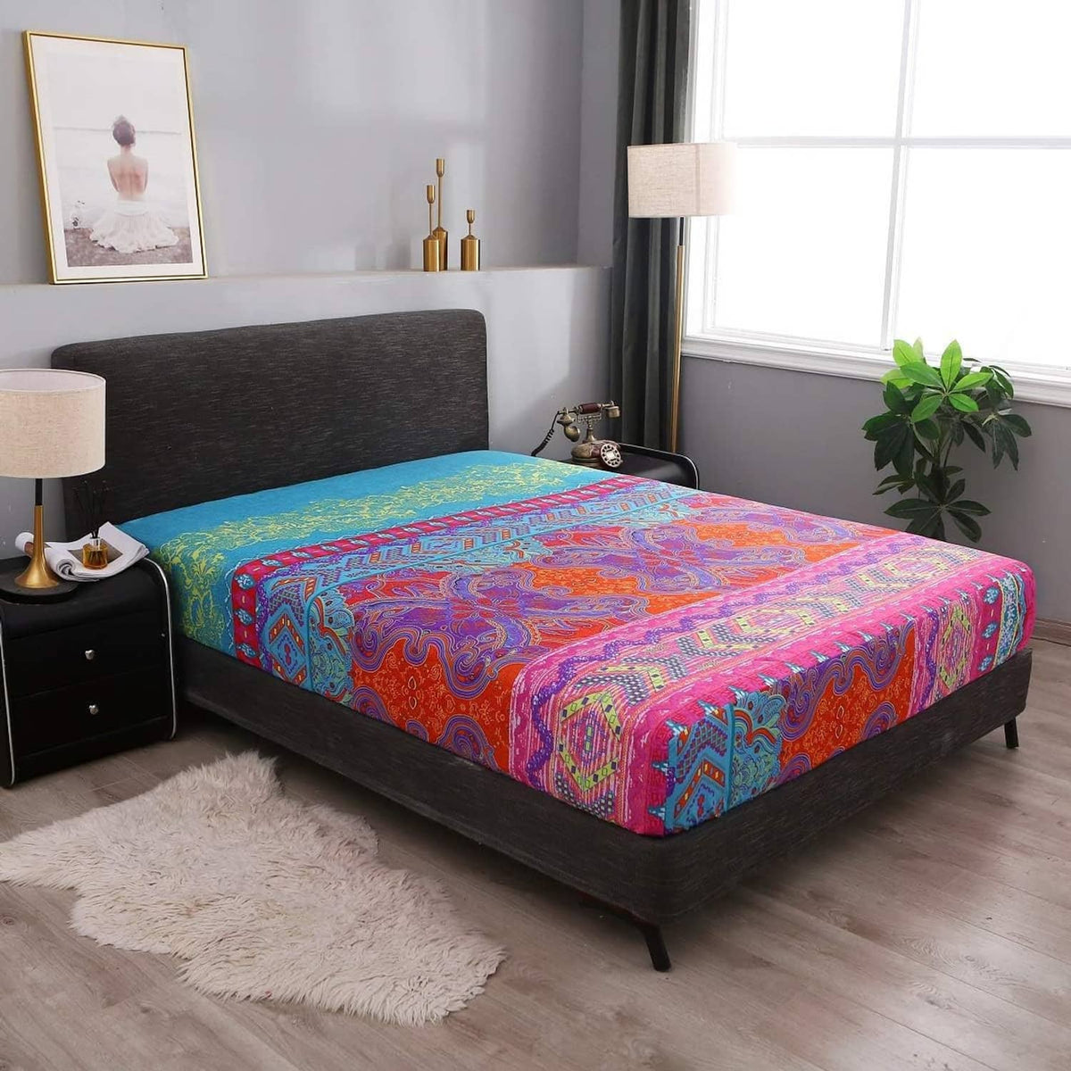 Vibrant boho paisley bedding set with fitted sheet and colorful flat sheet on bed