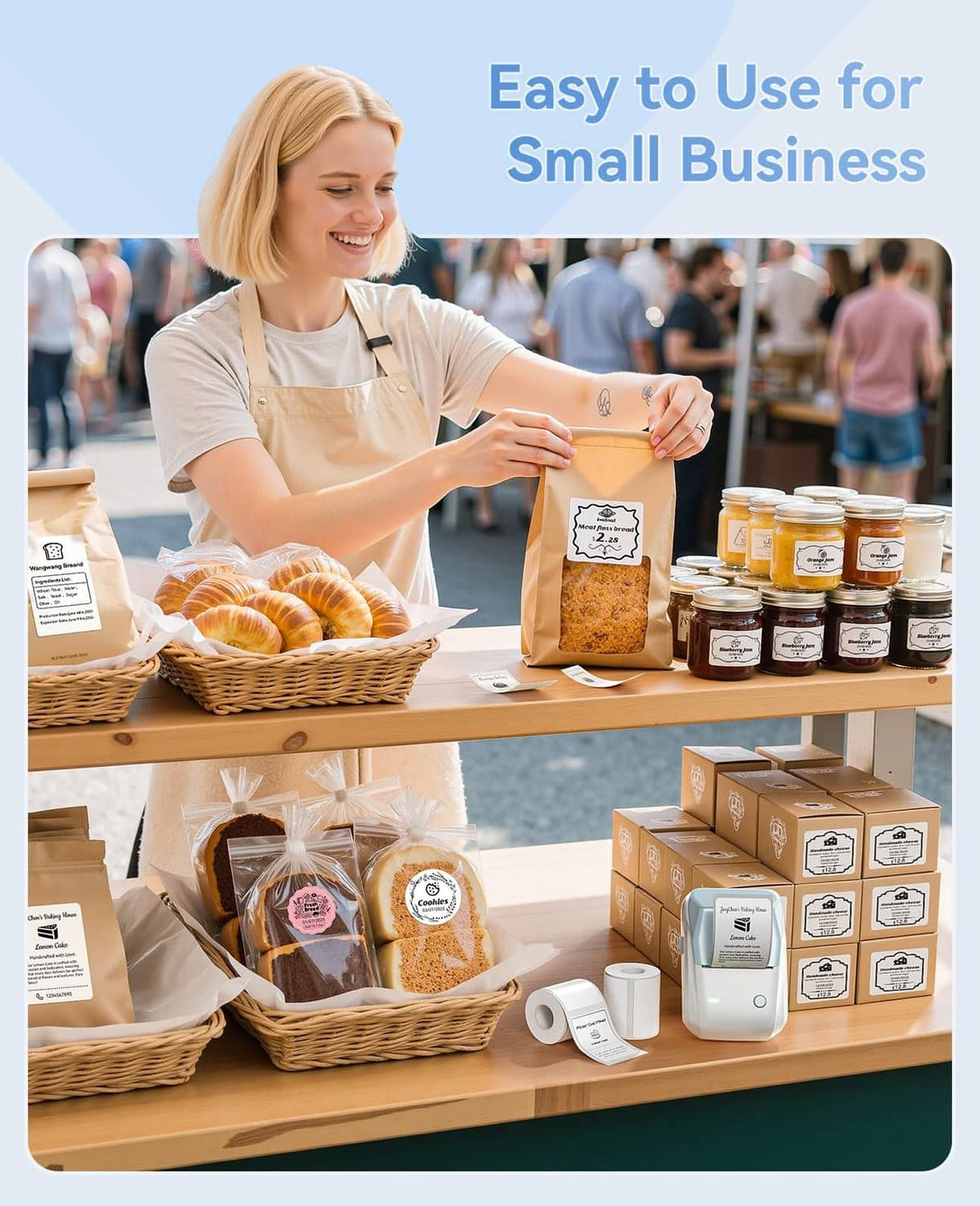 Small business stall with a NIIMBOT label maker and roll labels on a wooden counter