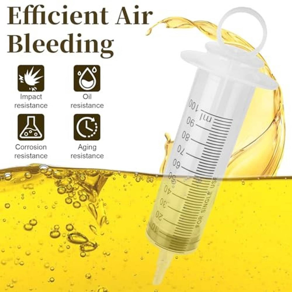 Motorcycle brake bleeder syringe with clear tube and filled measuring chamber of fluid