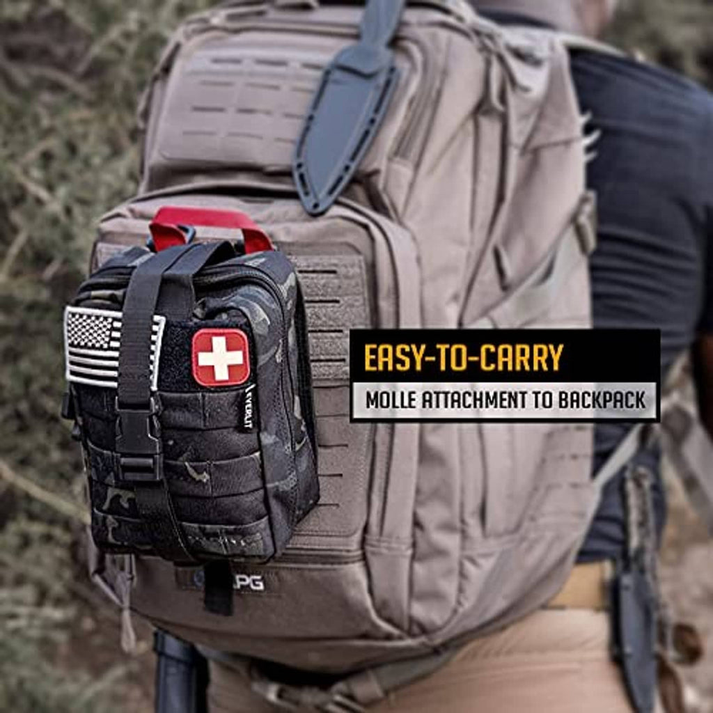 Black MOLLE first aid pouch with red cross patch attached to a backpack