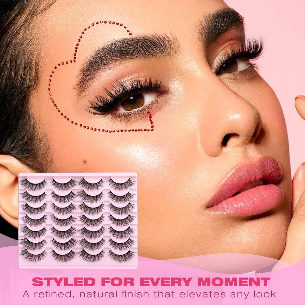 False eyelashes set in black, arranged on pink tray for styling