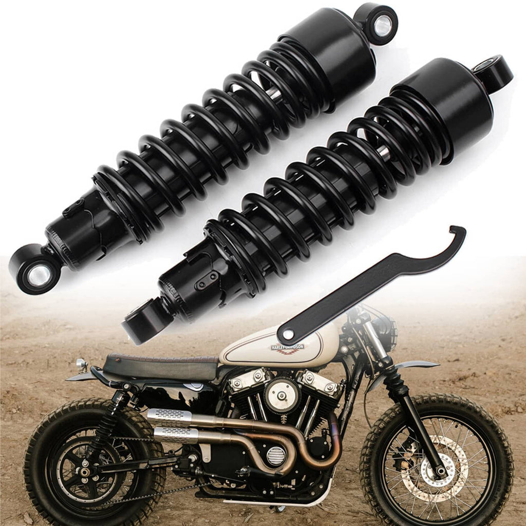 Pair of black rear shock absorbers with coil springs and eye-bolt mounts