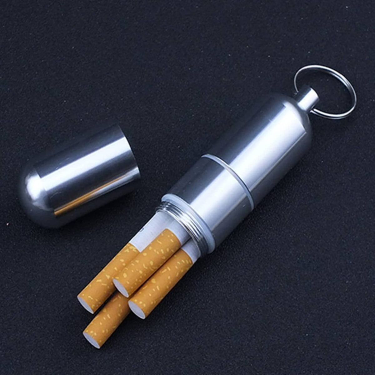 Silver metal cigarette case keychain with cigarettes partially inserted