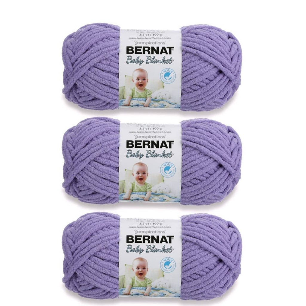 Lilac Bernat baby blanket yarn 3-pack skeins with product labels