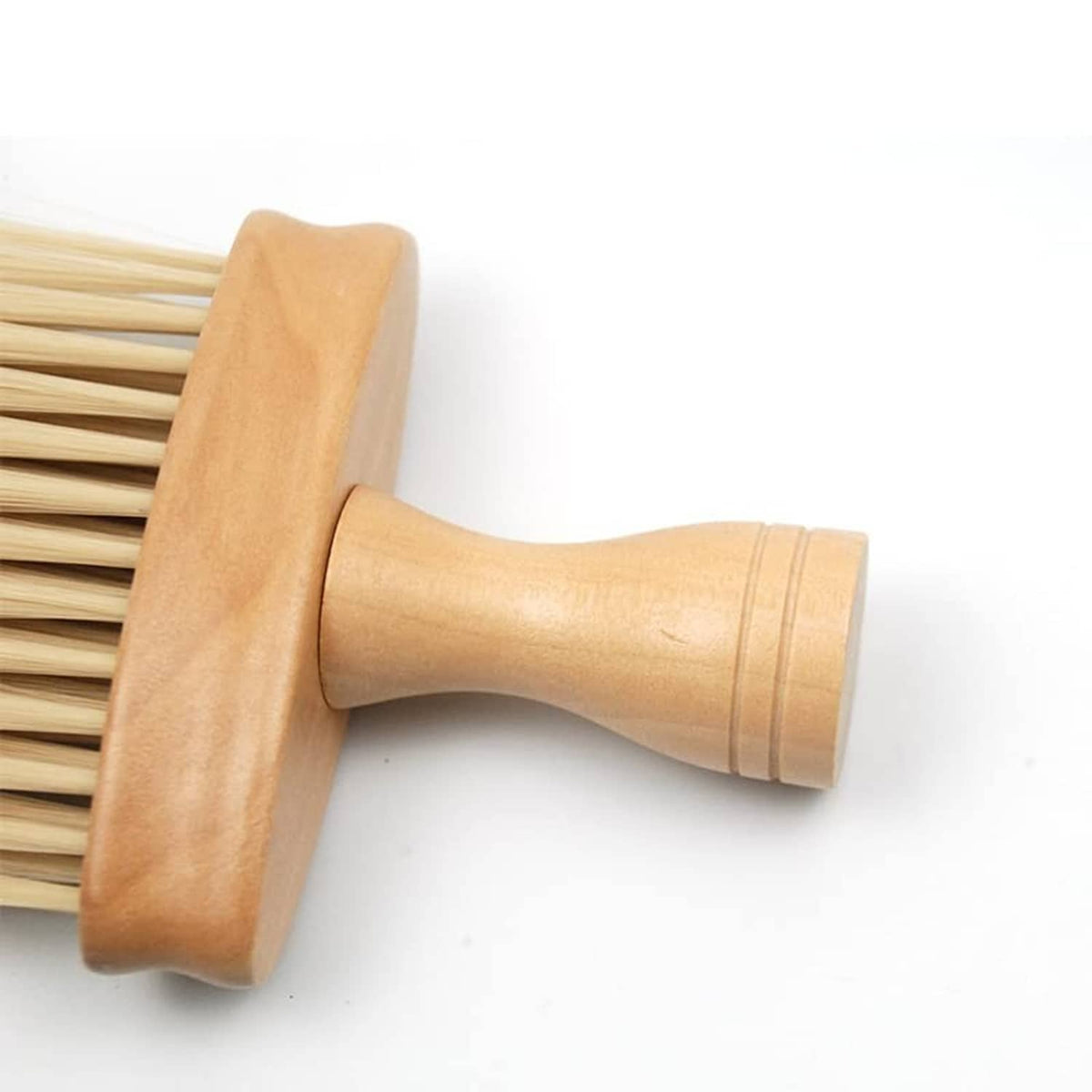 Wooden hair cutting brush with smooth handle and dense pale bristles