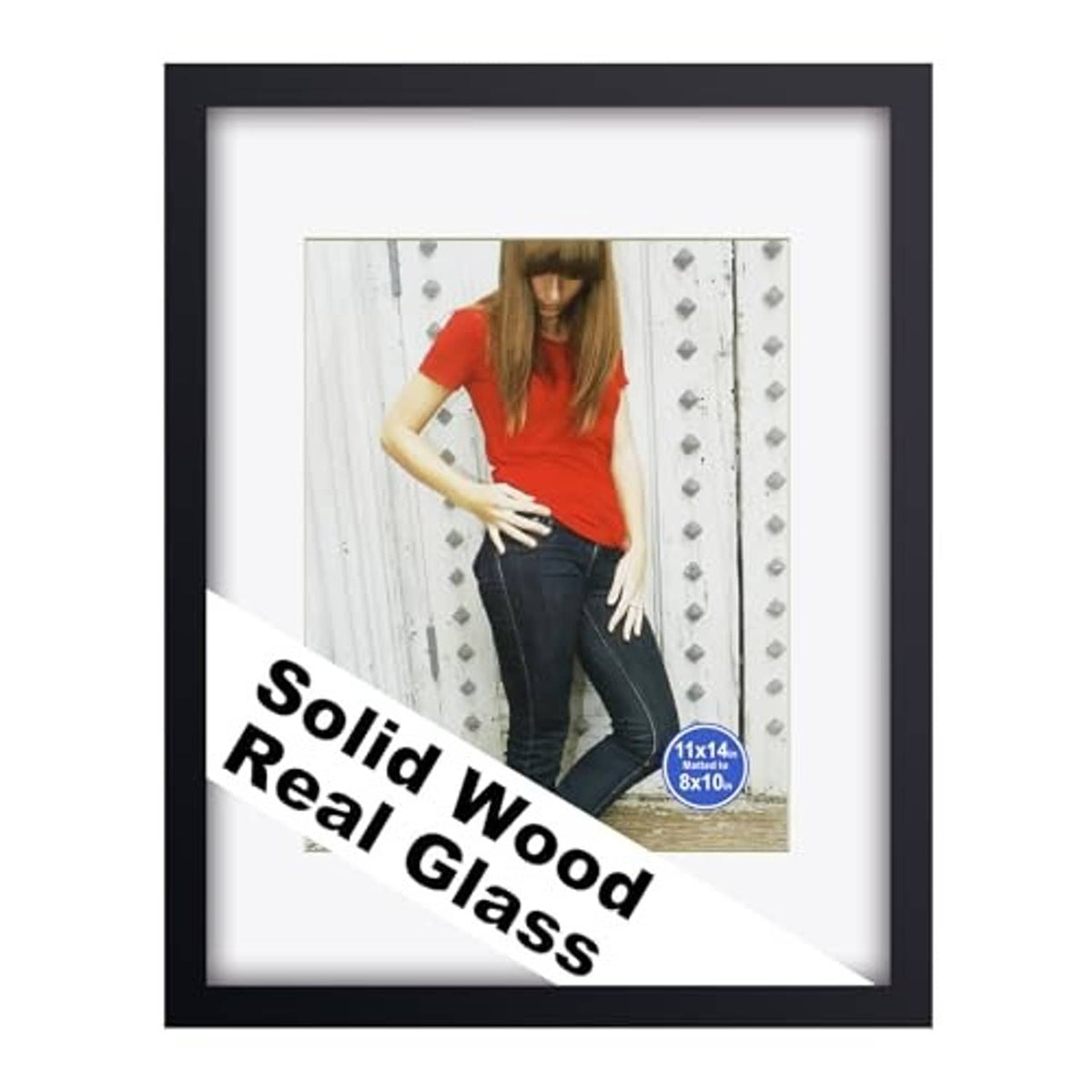 Black wooden picture frame with white mat and clear glass, holding a portrait photo