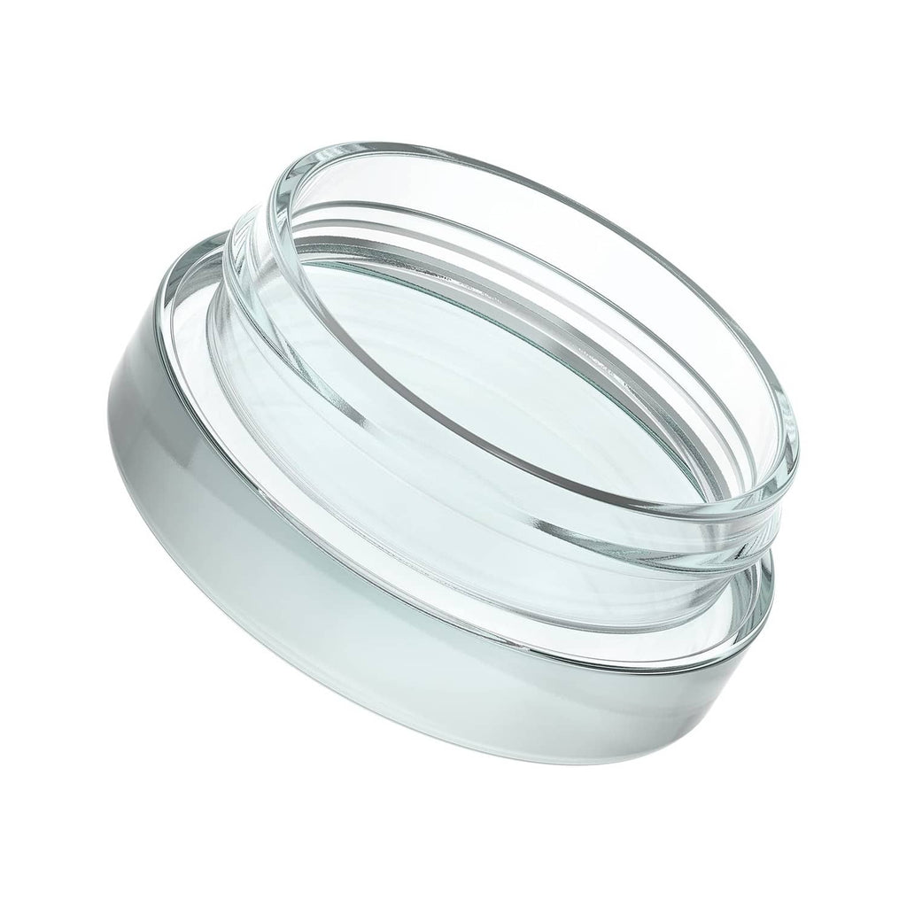 Clear glass jar with black lid, side view