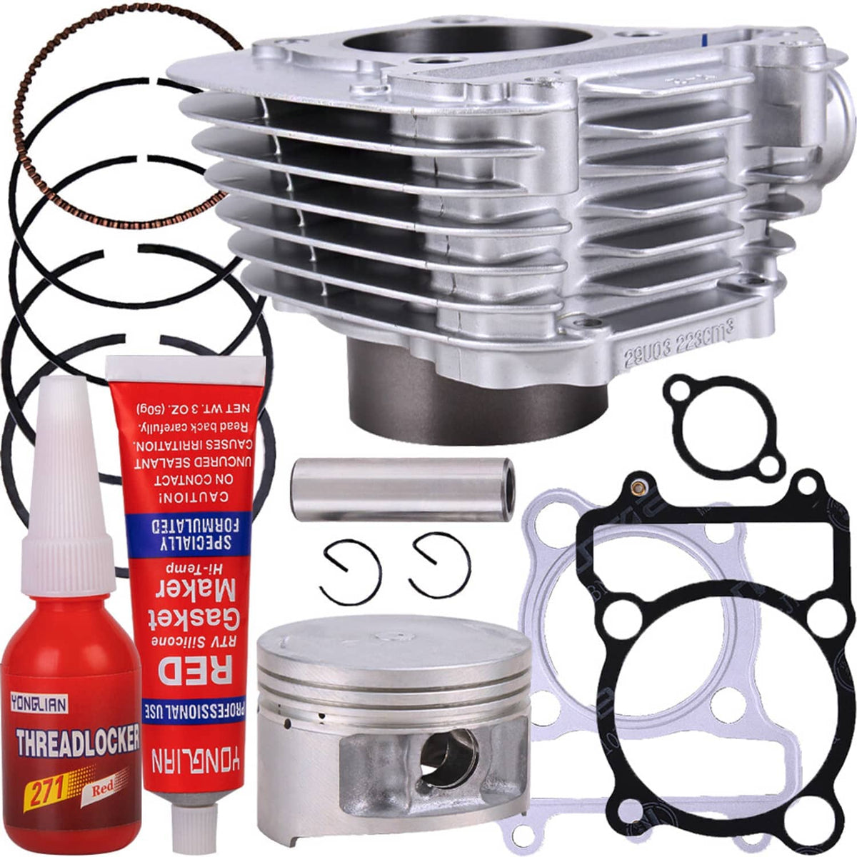 ATV top-end rebuild kit showing cylinder, piston, rings, gaskets, wrist pin, sealant