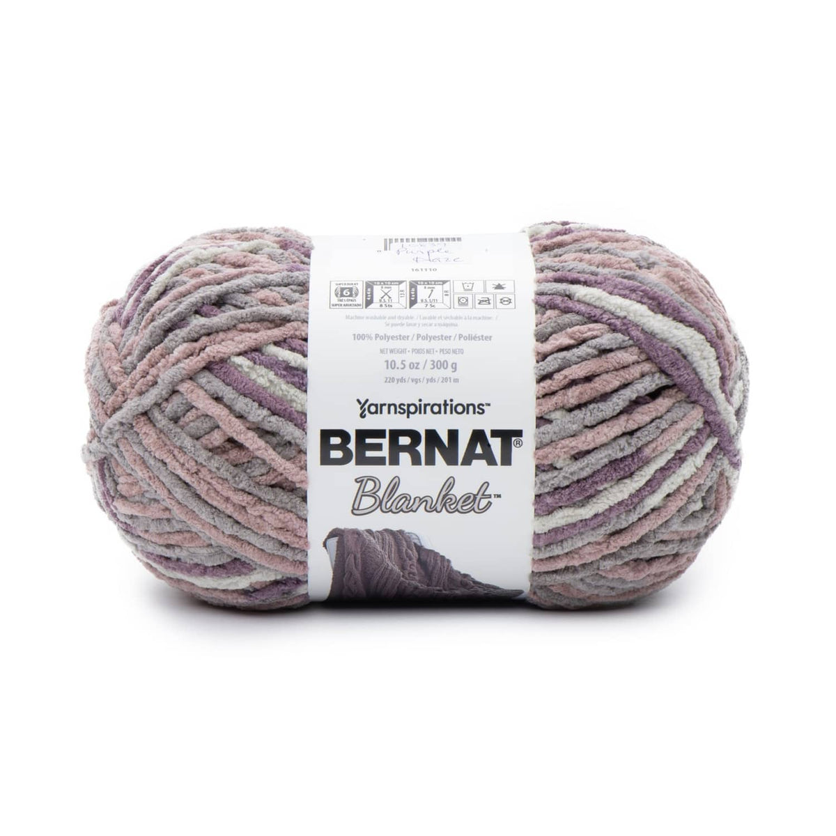 Bernat Super Bulky chenille-style yarn skein in mauve, purple, and gray tones