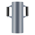 Manual fence post driver rammer with large gray cylindrical impact head and two grip handles