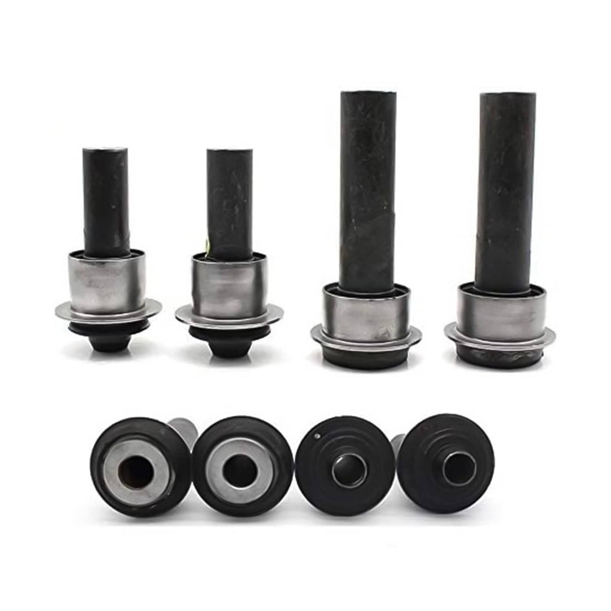 Set of four front subframe bushings showing black rubber cylinders and silver metal ends.