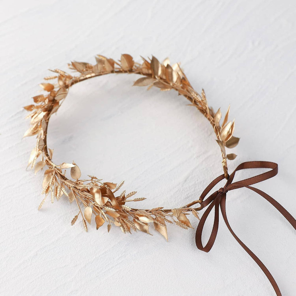 Gold leaf circular hair wreath with brown ribbon ties and dangling leaf accents