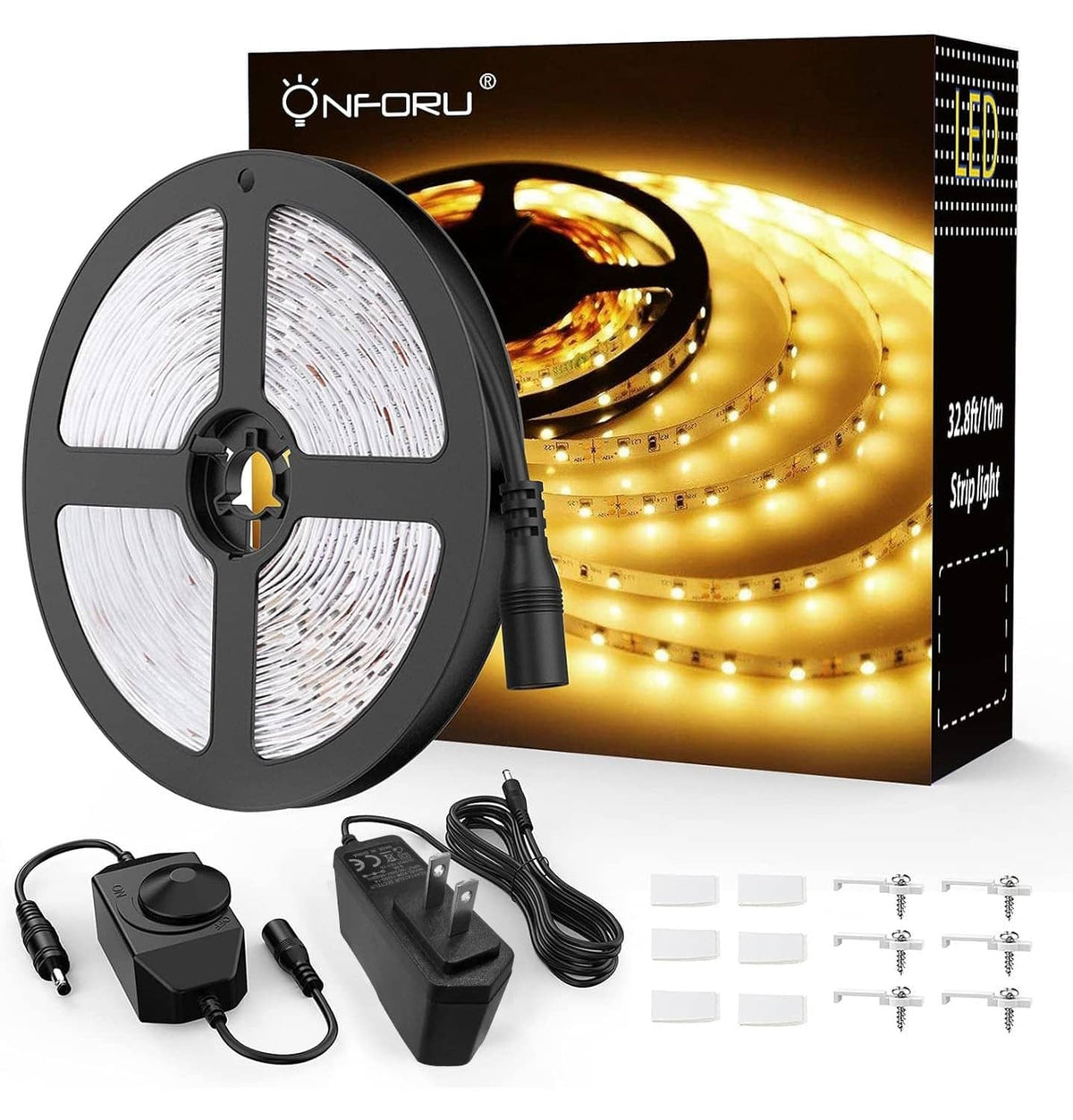 Warm white LED strip light kit with coiled strip, controller, power adapters, and mounts