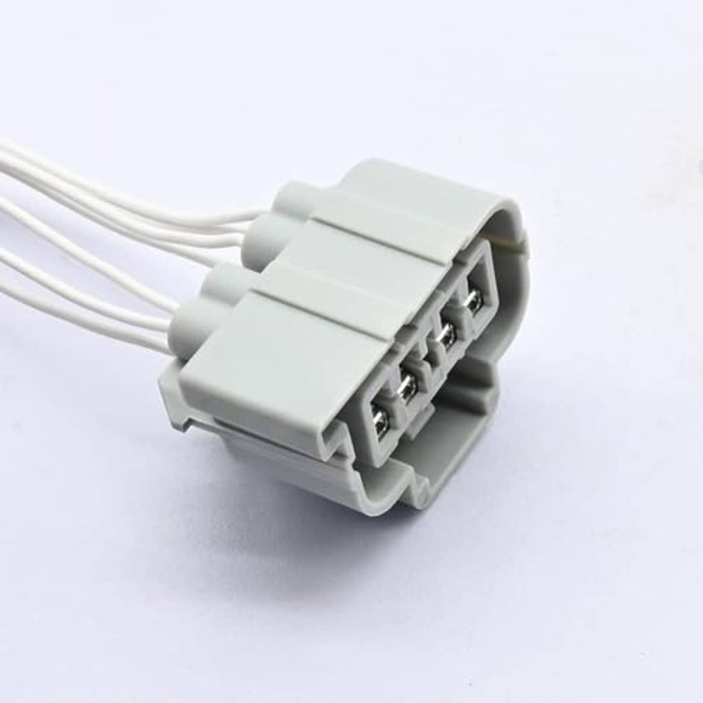 Headlight connector pigtail harness close-up of gray plug with three wire leads