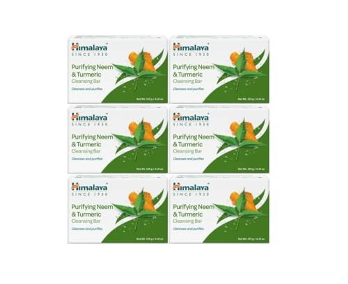 Purifying Neem & Turmeric cleansing bar boxes with green soap theme