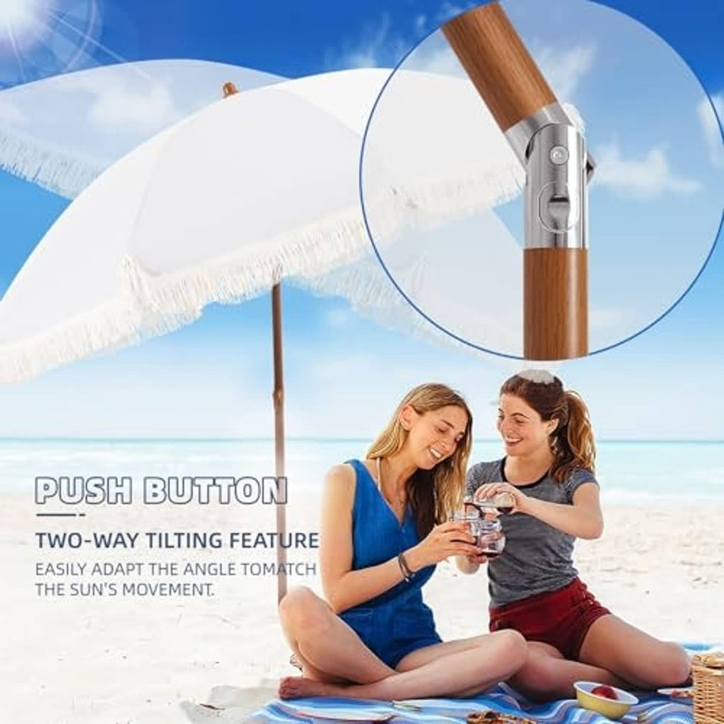 Cream patio umbrella with fringe and push-button two-way tilting feature