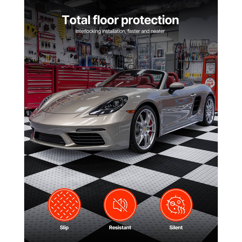 Interlocking garage floor tiles in a black-and-white checkered layout under a car