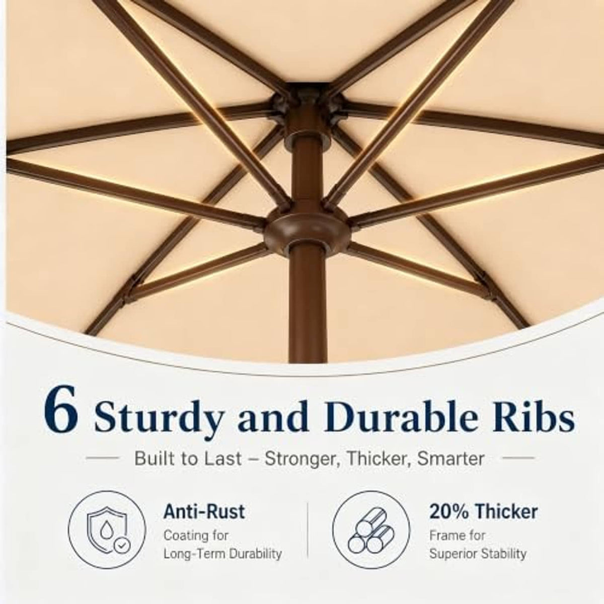 Patio umbrella underside showing khaki canopy with dark rib frame and central pole