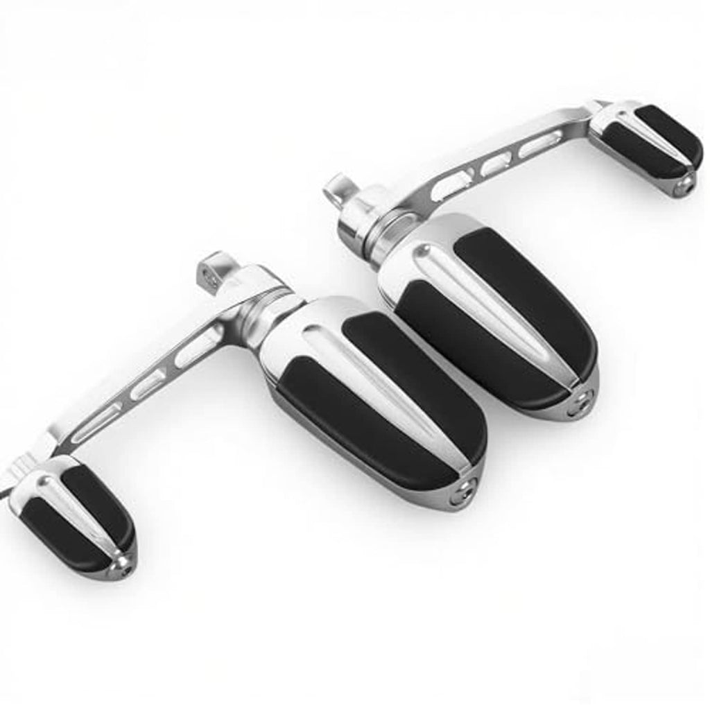 Motorcycle highway foot pegs with black rubber pads and silver metal lever-style mounts