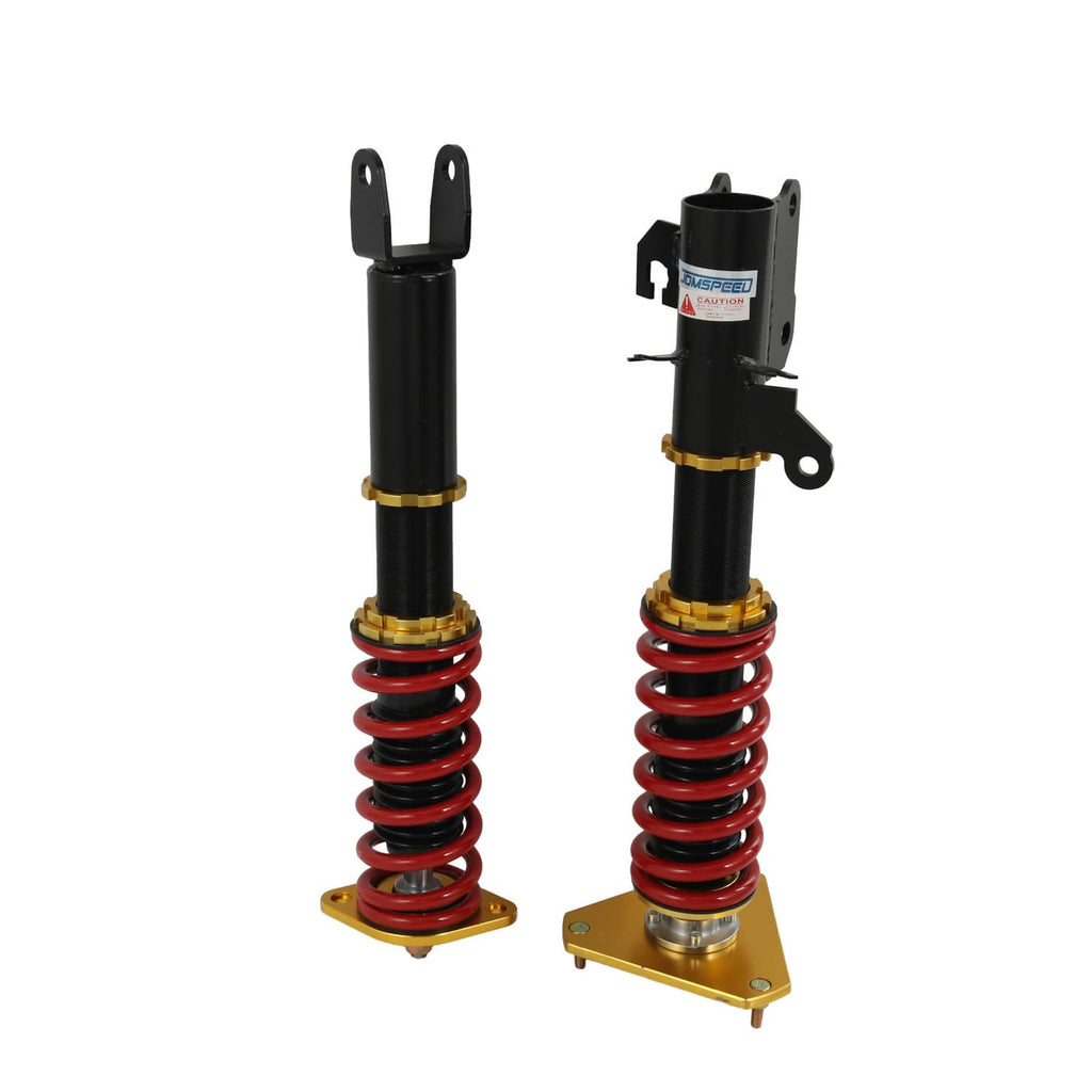 Two complete coilover strut assemblies with black dampers, red coils, gold base plates