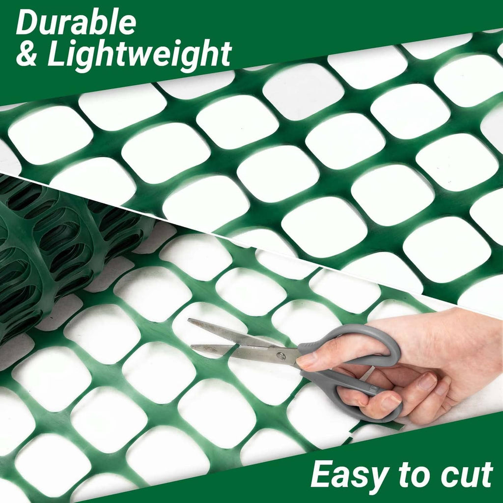 Green plastic mesh safety fence sheet being cut with scissors