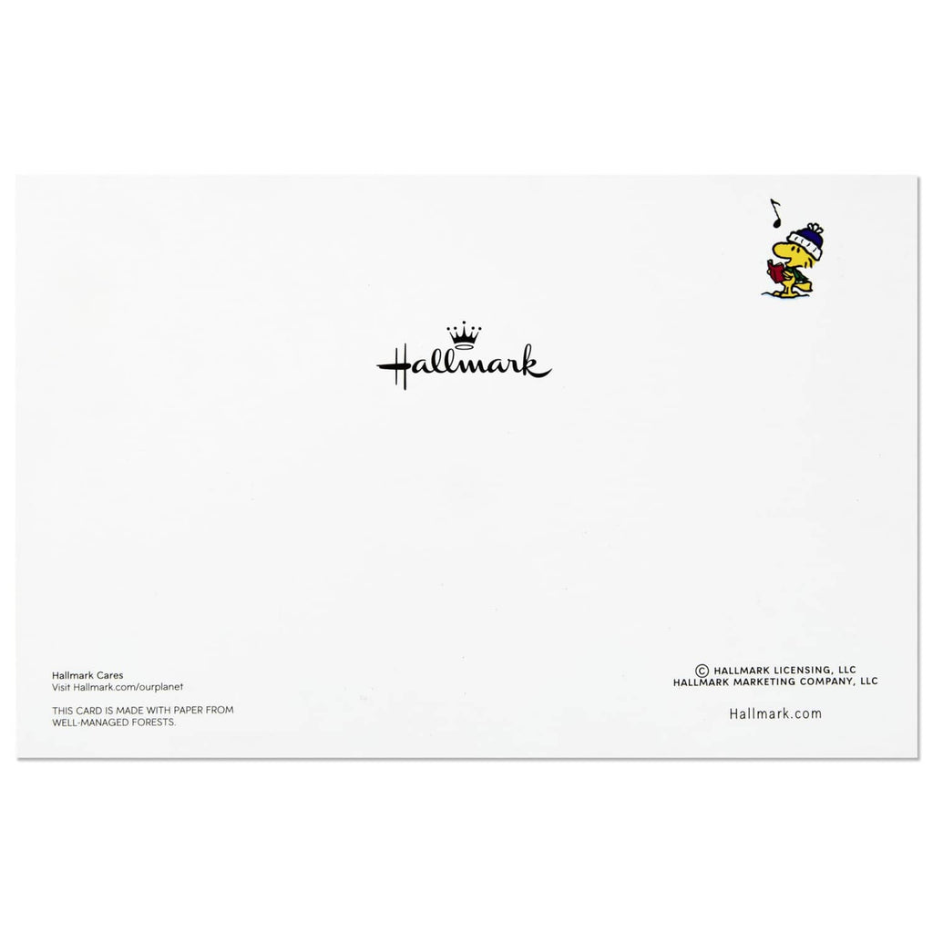 Back of Hallmark holiday card with “hallmark” logo and small licensing text