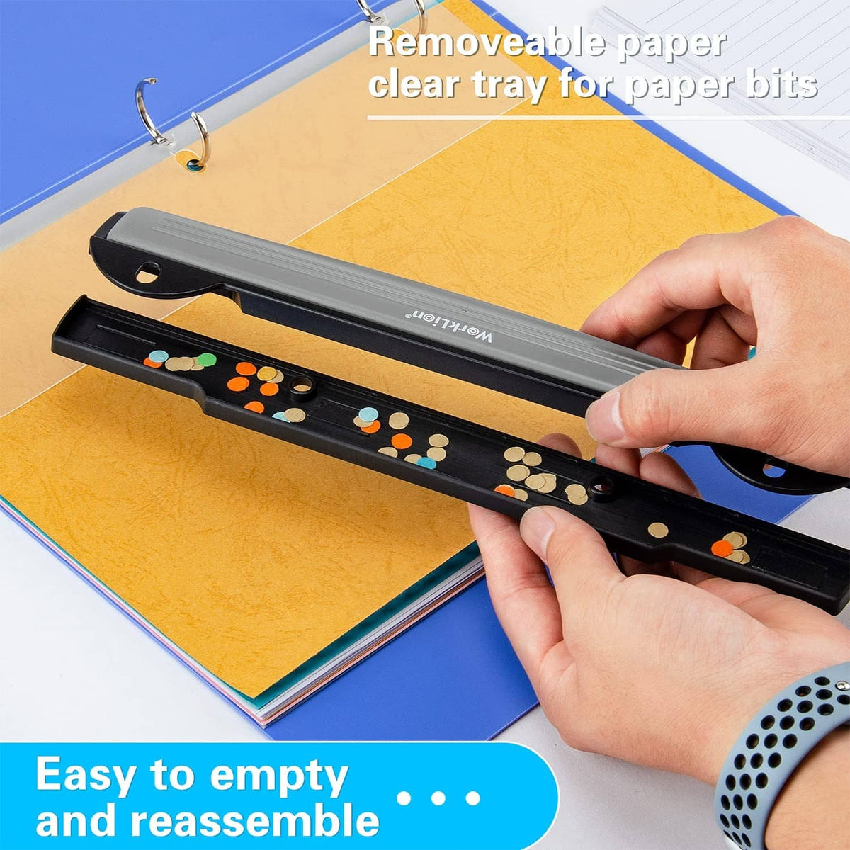 3-hole binder punch with removable clear chip tray and ruler on the body