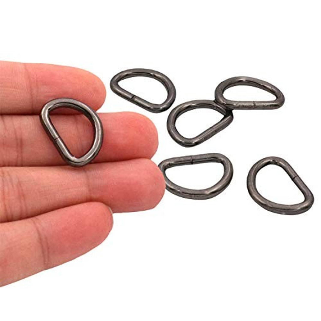 Metal D-ring buckle rings, dark bronze, shown in hand with open oval shape