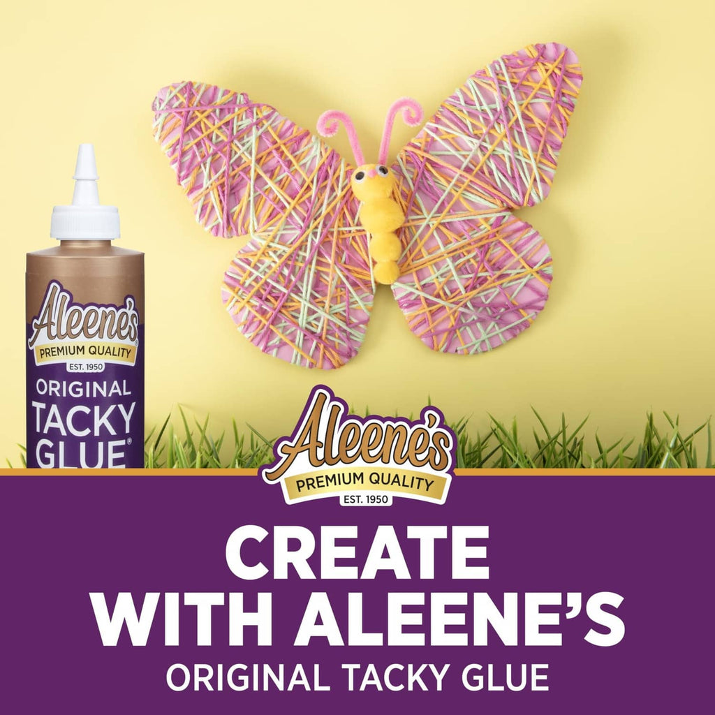 Aleene's Original Tacky Glue bottle with nozzle for nail crafting projects
