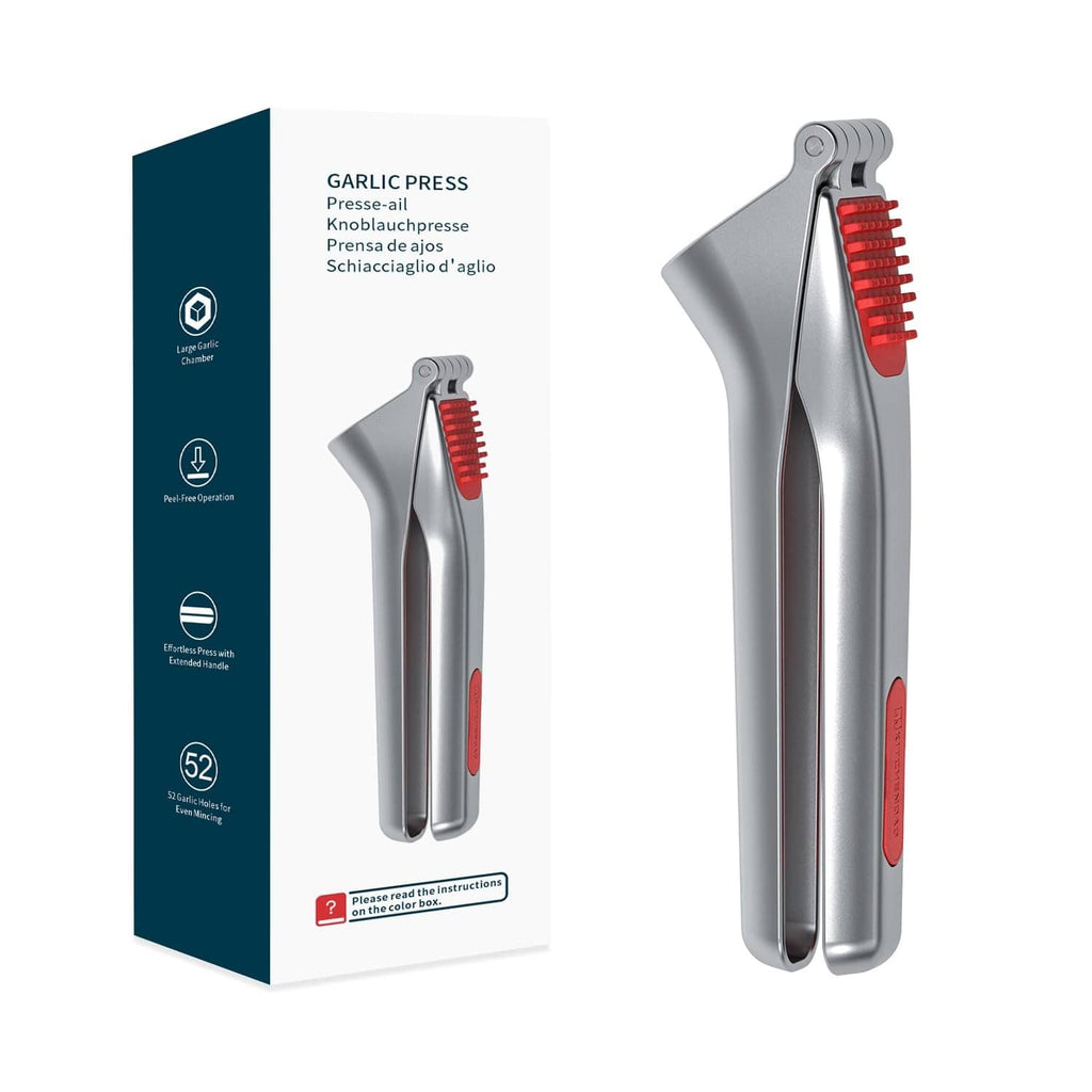 Garlic press with built-in red scraper brush and cleaning pusher