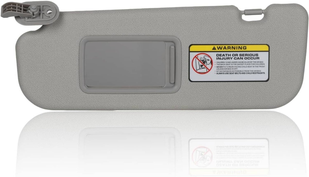 Grey sun visor with vanity mirror window and label, left driver-side version