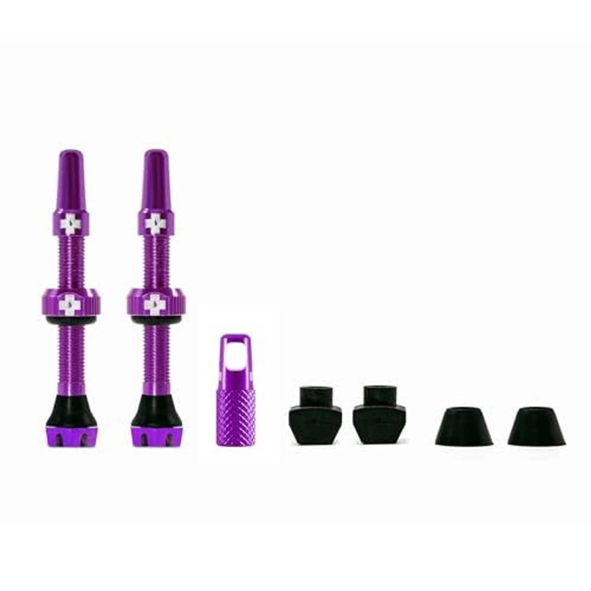 Purple Presta tubeless valves with black bases, cap, and spare rubber parts