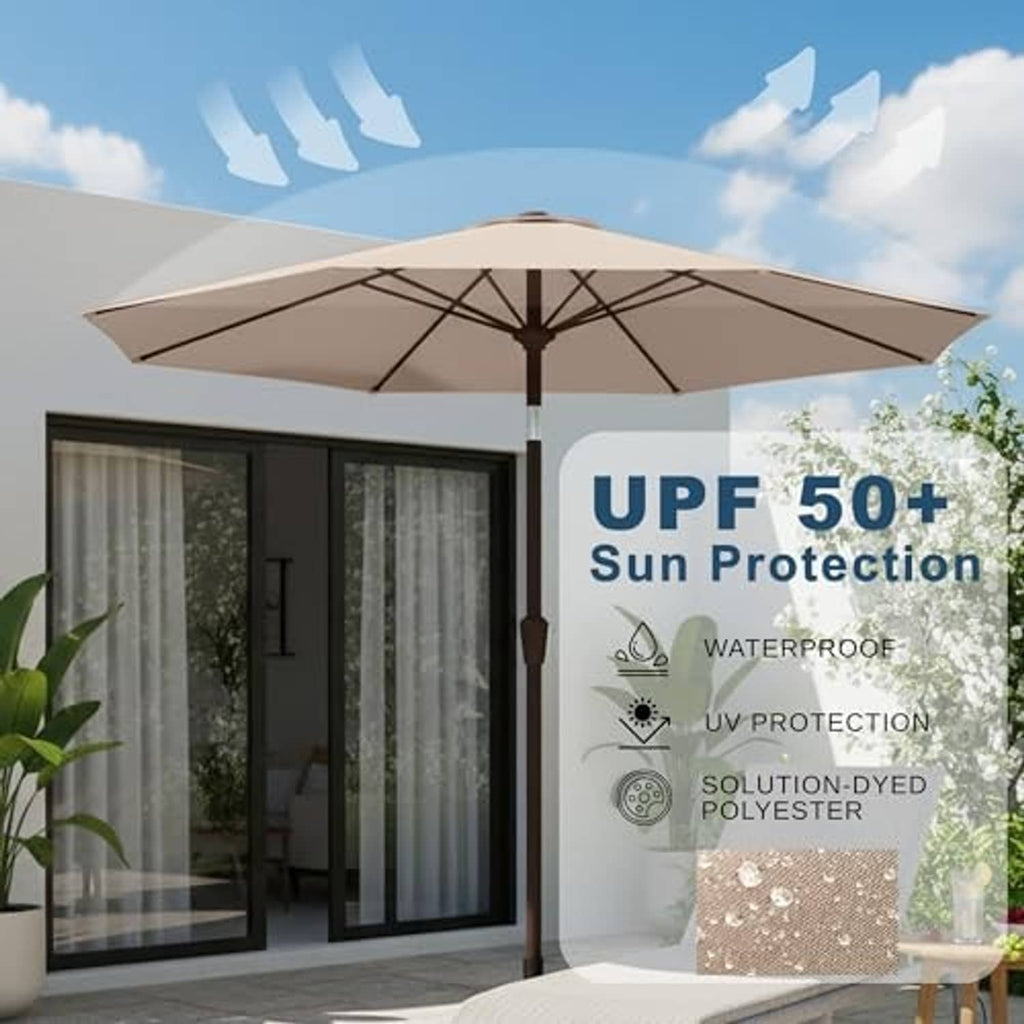 Beige patio umbrella open over outdoor seating area, with crank pole and canopy