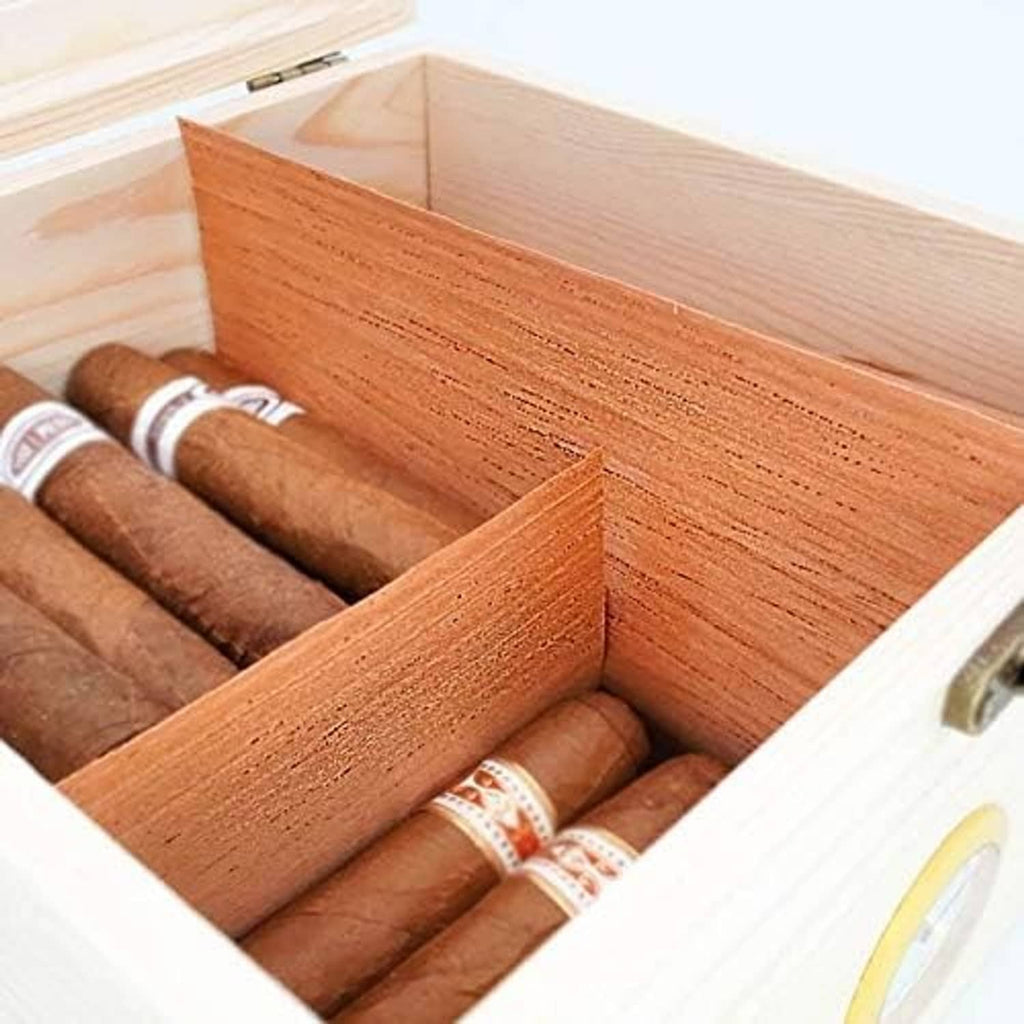 Spanish cedar humidor compartment with angled cedar dividers and cigars
