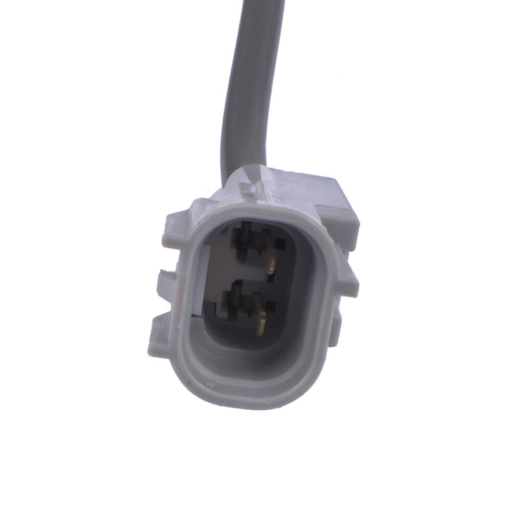 A/C compressor electrical connector plug on gray housing, close-up view