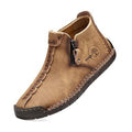 Men's tan chukka ankle boots with side zipper and stitched midsole