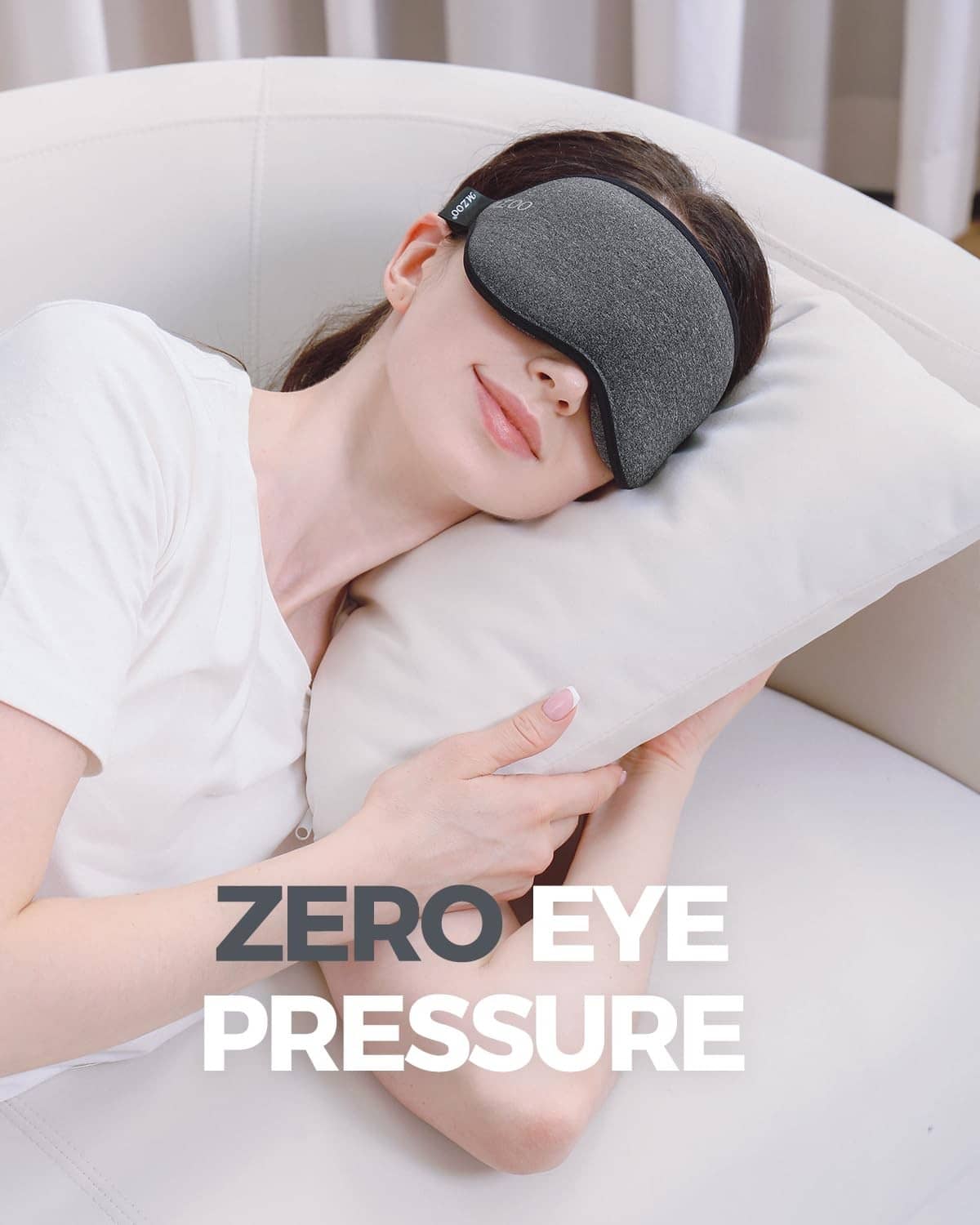Contoured dark gray sleep mask with black edge, cushioned eye coverage