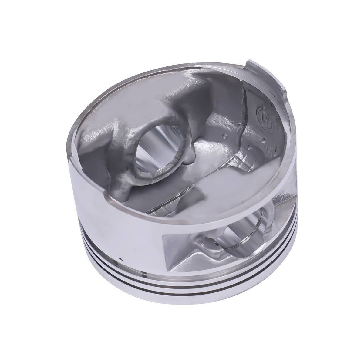 Silver engine piston with ring grooves and valve reliefs, close-up