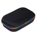 Black pencil box with rainbow-trim zipper edge and rounded molded shape.