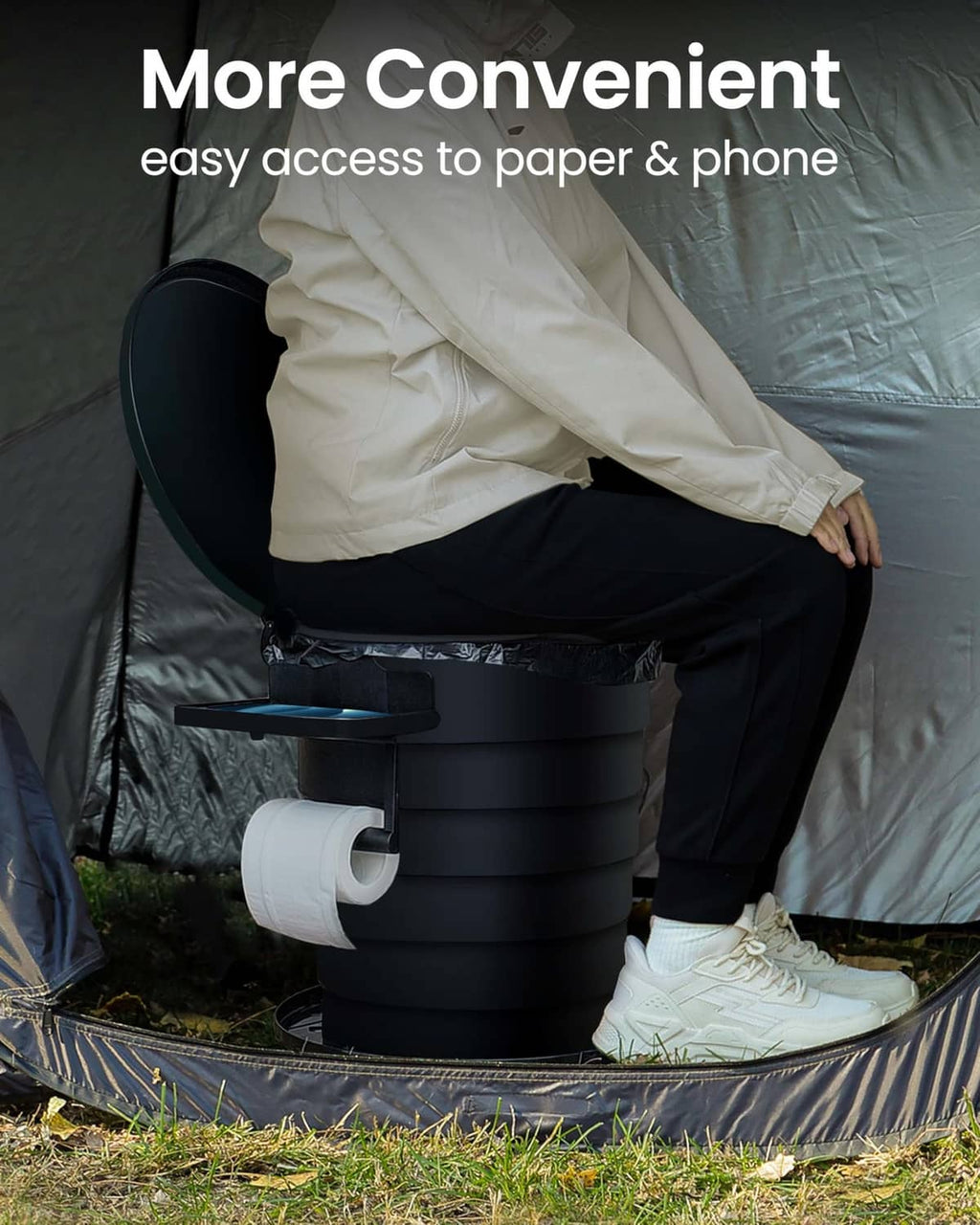 Portable foldable toilet with open lid and paper-access side holder, dark