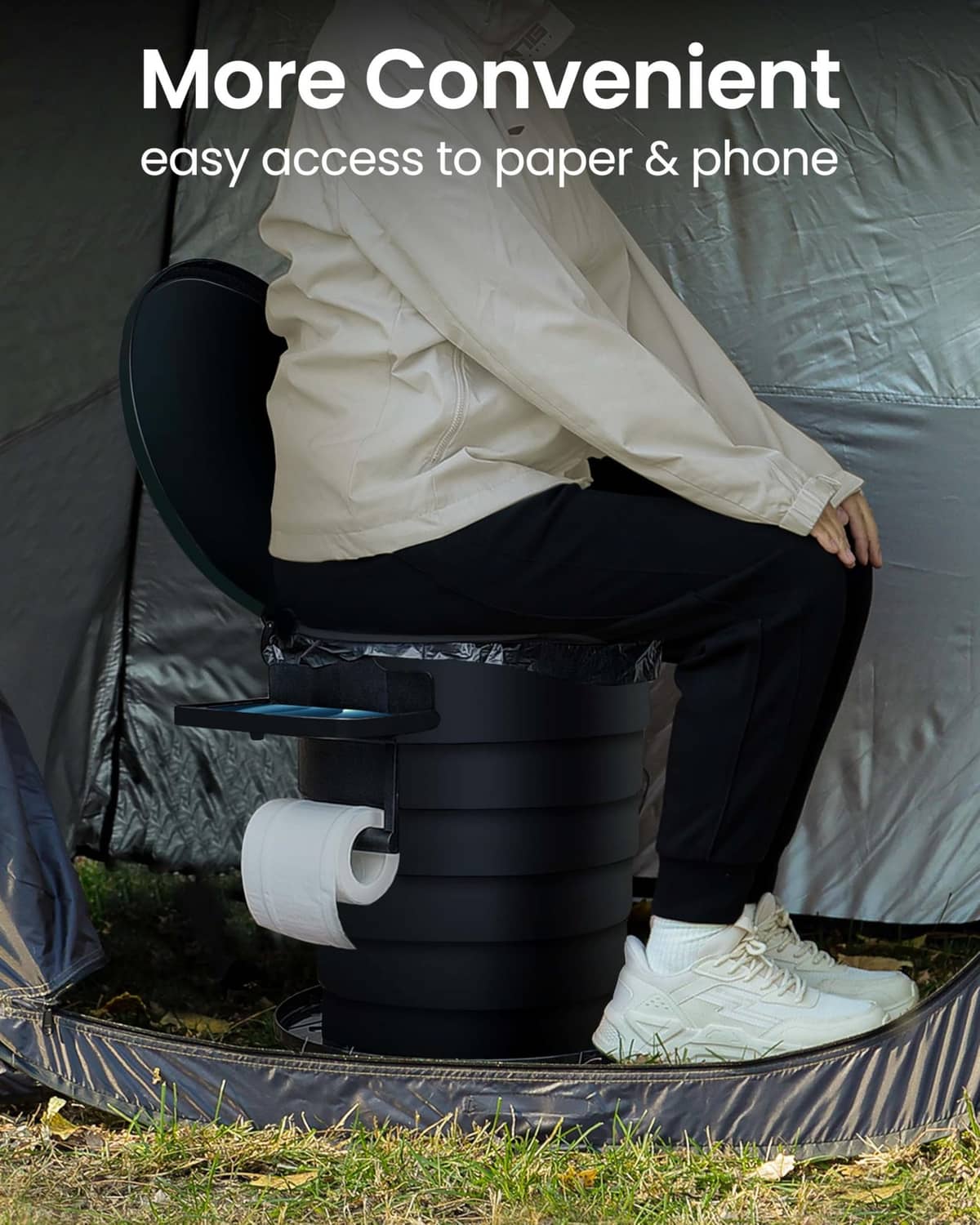 Portable foldable toilet with open lid and paper-access side holder, dark