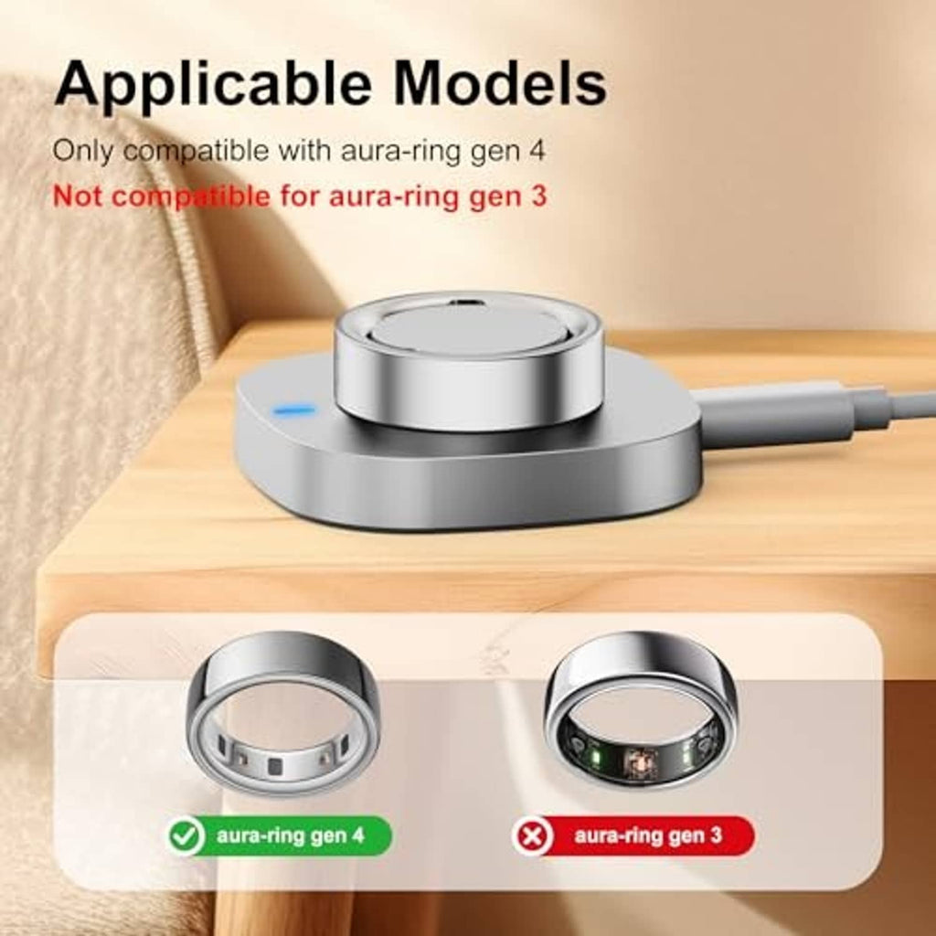 Metal charging dock on tabletop with ring cradle and charging cable attached
