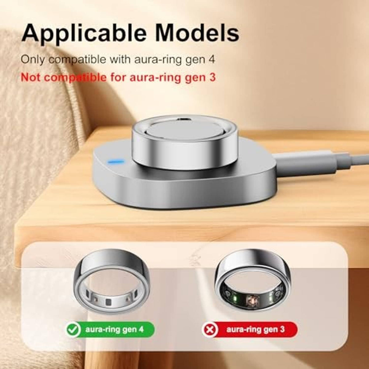 Metal charging dock on tabletop with ring cradle and charging cable attached